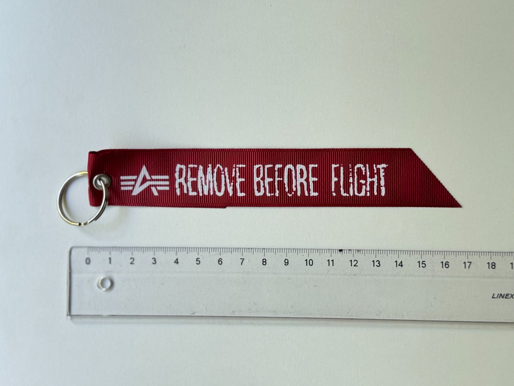 Schlüsselanhänger & - bänder: Ruban Remove Before Flight – Alpha Industries U.S.A. – Neu (gemäss Beschreibung) aus Genève von Reveur 2