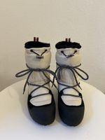 White leather Bally boots lined with fur in size 37