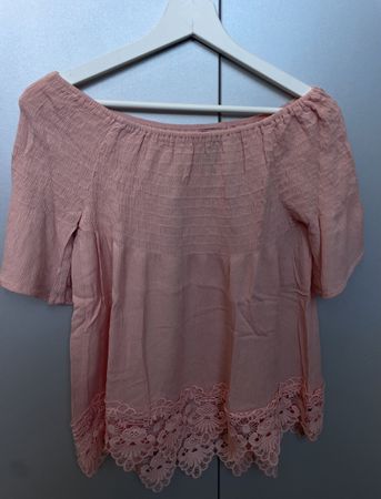 Boho Chic: Pink Off-Shoulder Top with Lace Details