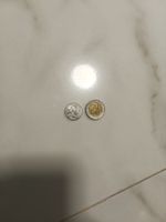 Philippinische Pesos 10 und 1Peso