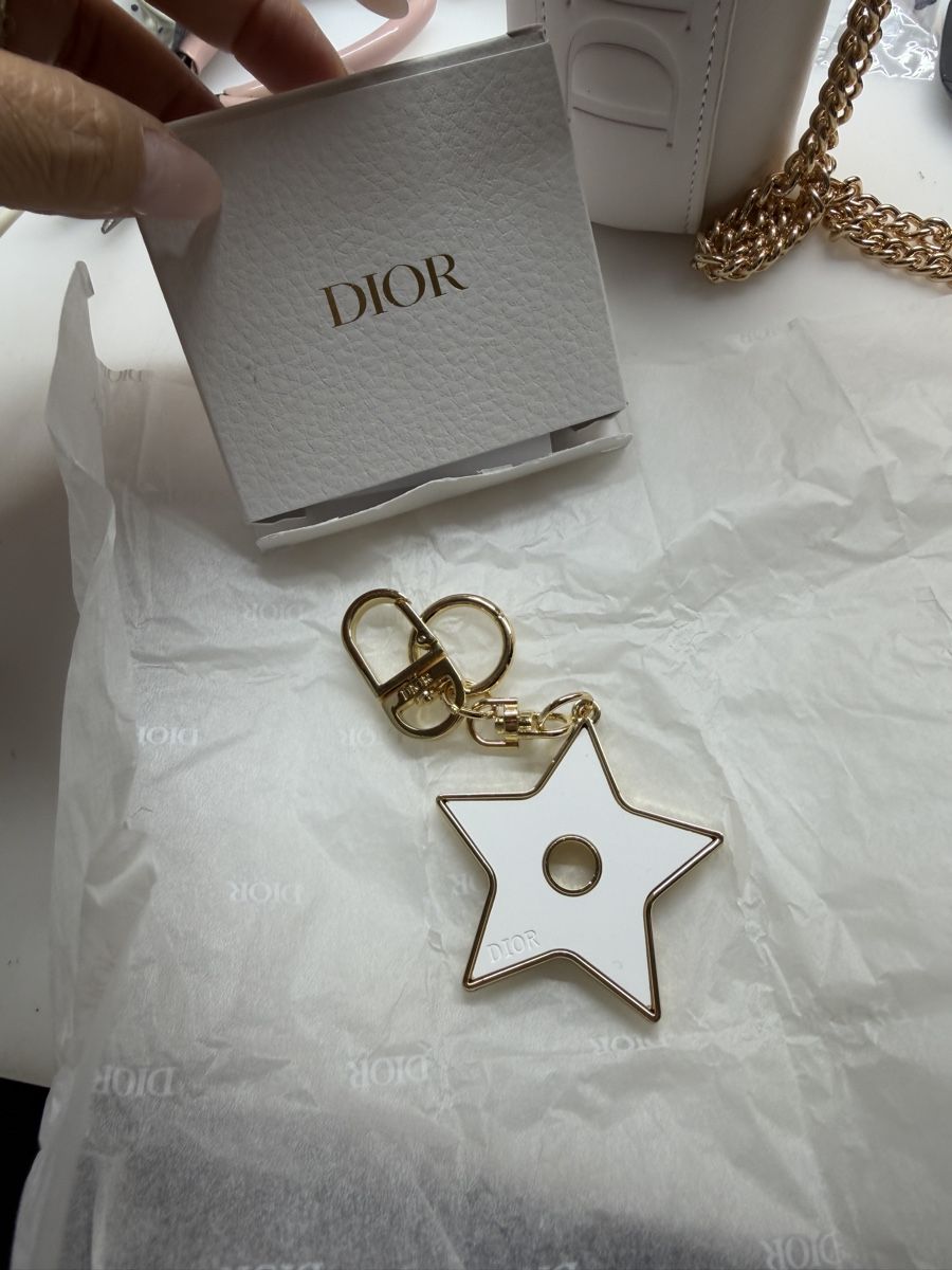 Dior Porte-clés: Dior Star Aroma Stone Keychain  – Neuf avec emballage d'origine à Chur par Madeys