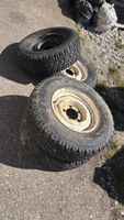 4 Diverse Jeep Pneu und Felgen.