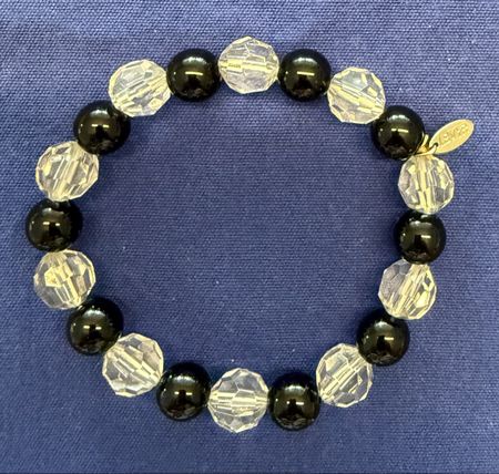 Elastisches Armband mit schwarzen und transparenten Kugeln