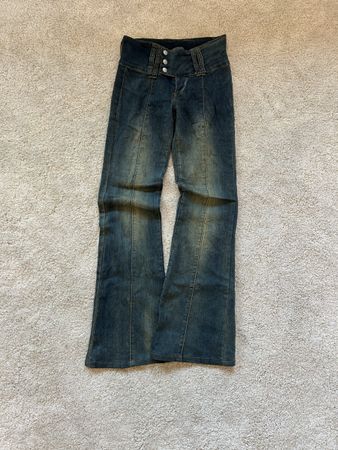 cute vintage jeans with design on the back 
