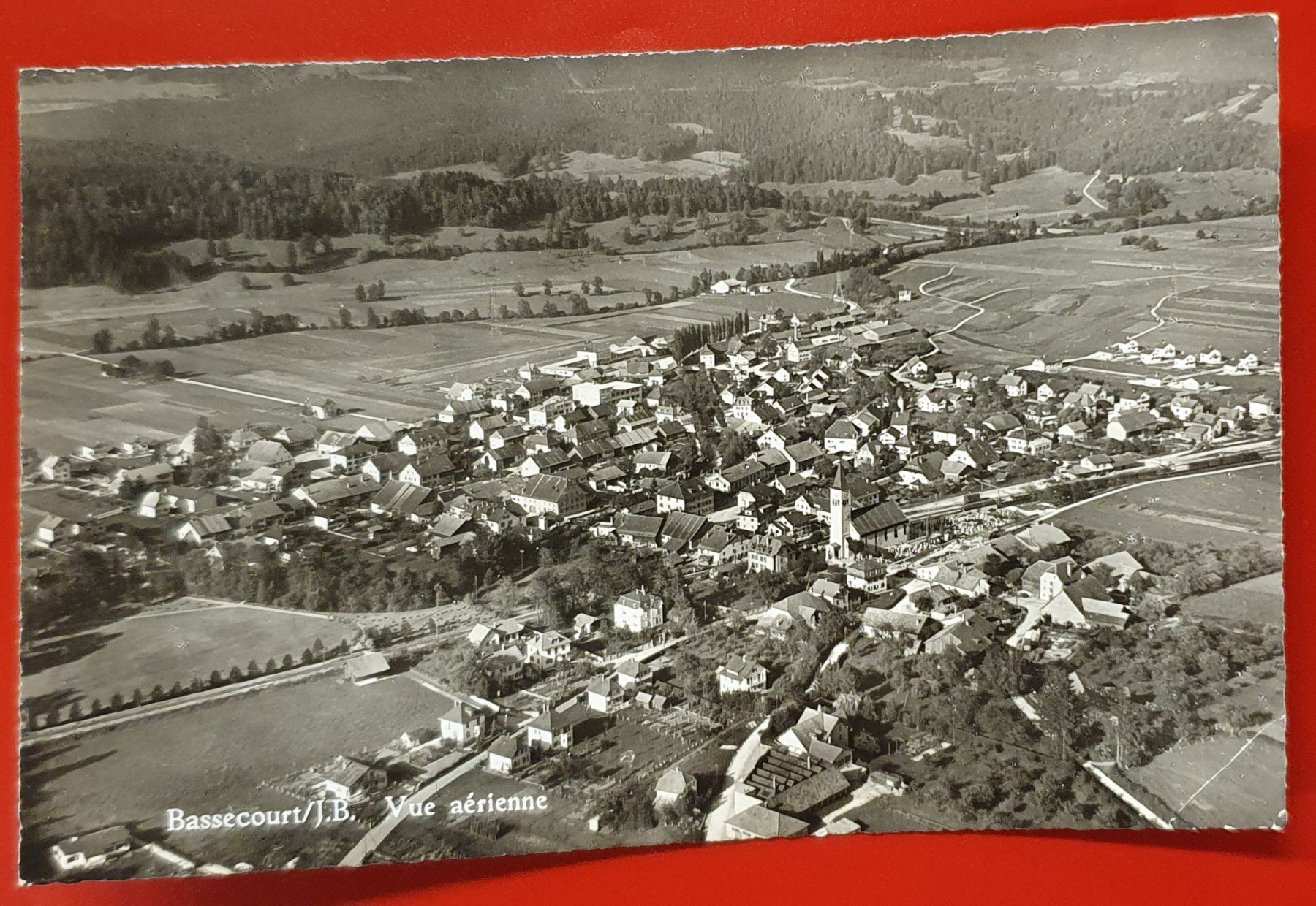 Cartoline postali: Bassecourt 1955 - Flugaufnahme – Usato da Kreuzlingen venduto da Rschweiz1
