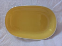 Plat ancien ovale jaune en porcelaine Rössler
