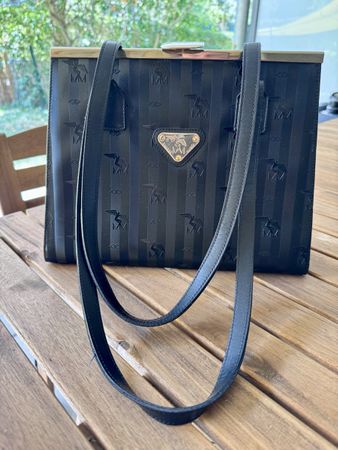 Maison Mollerus Suisse Tasche