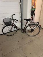 Bicicletta da uomo con cestino e portapacchi