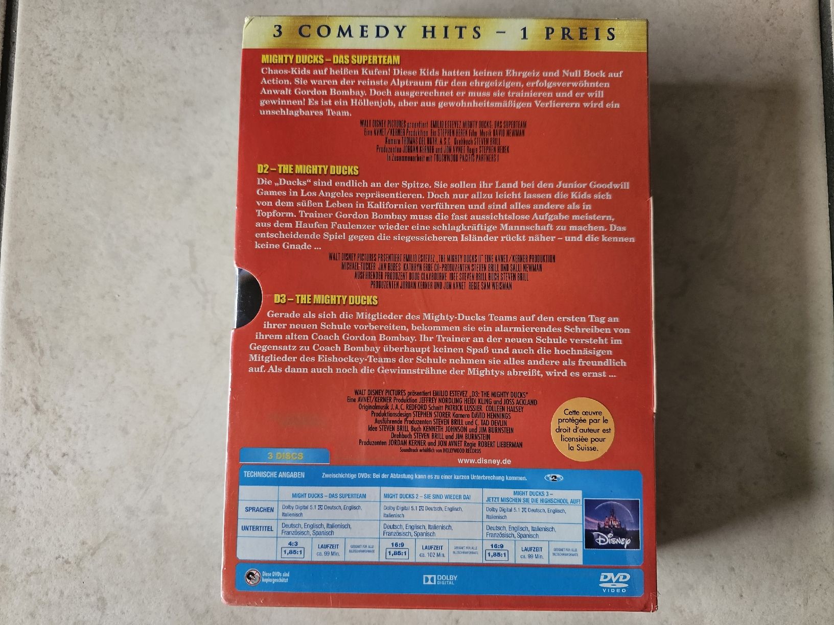 Tutti i DVDs: Mighty Ducks Collection  -  Teile 1 - 3 / Fabrikneu – Nuovo e nell'imballaggio originale da Schneisingen venduto da backstore24 1