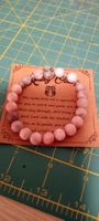 Armband mit Glückeule und rosa Steinen, neu