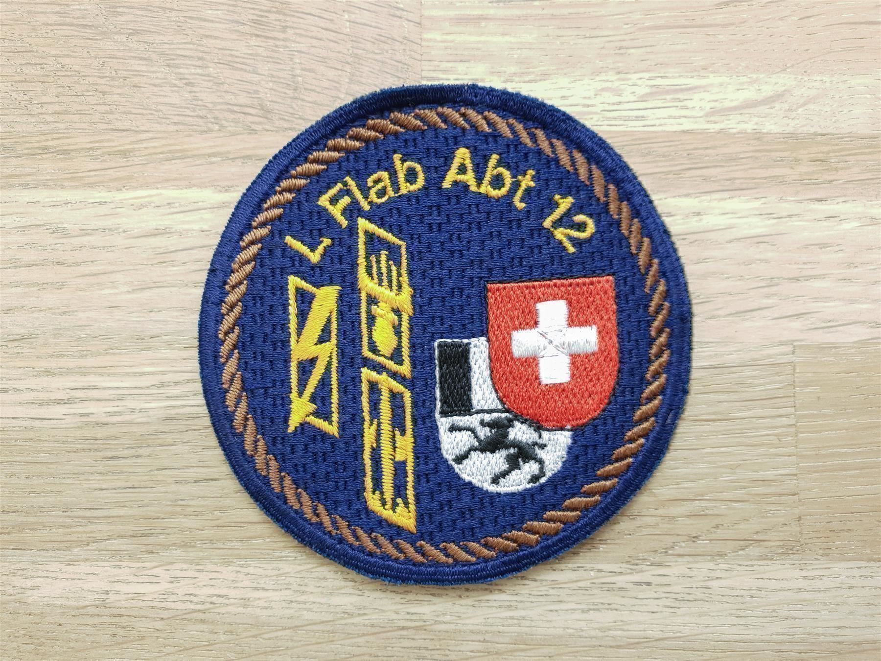 Placchette & Badge: Badge L Flab Abt 12 braun – Usato da Erlinsbach venduto da S700