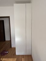 White ikea wardrobe with extra shelf