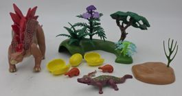 Lot Playmobil dinosaures avec décor