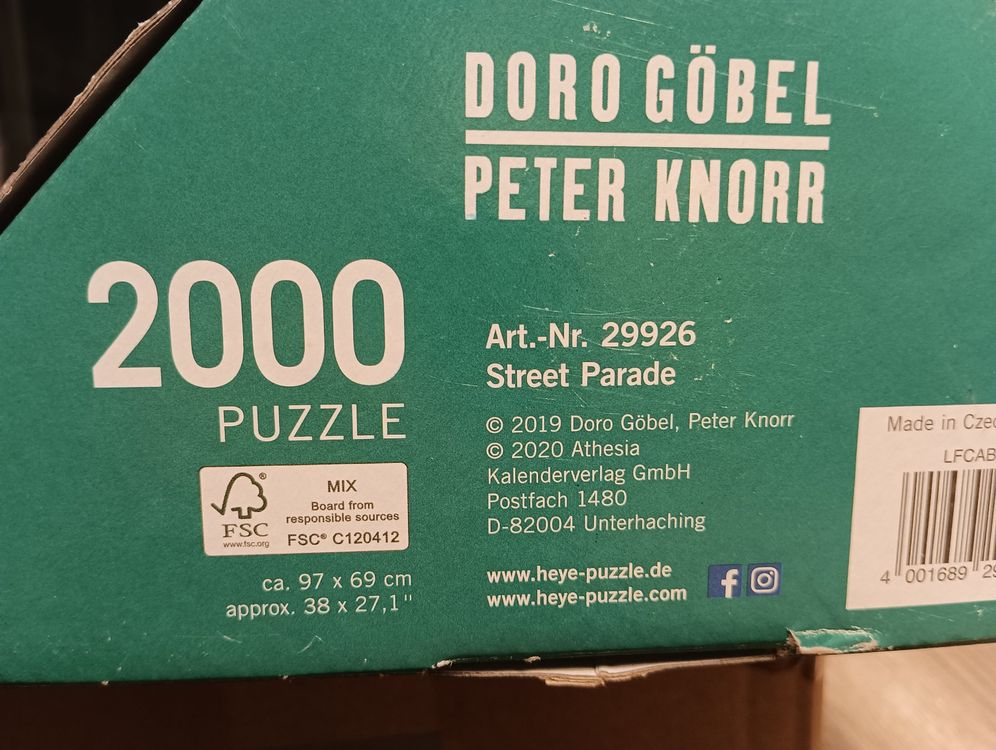 Puzzle Heye Street Parade 2000 Pièces - Doro Göbel & Peter Knorr - Neuf