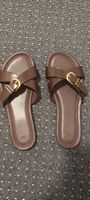 Ganz neue Sandalen