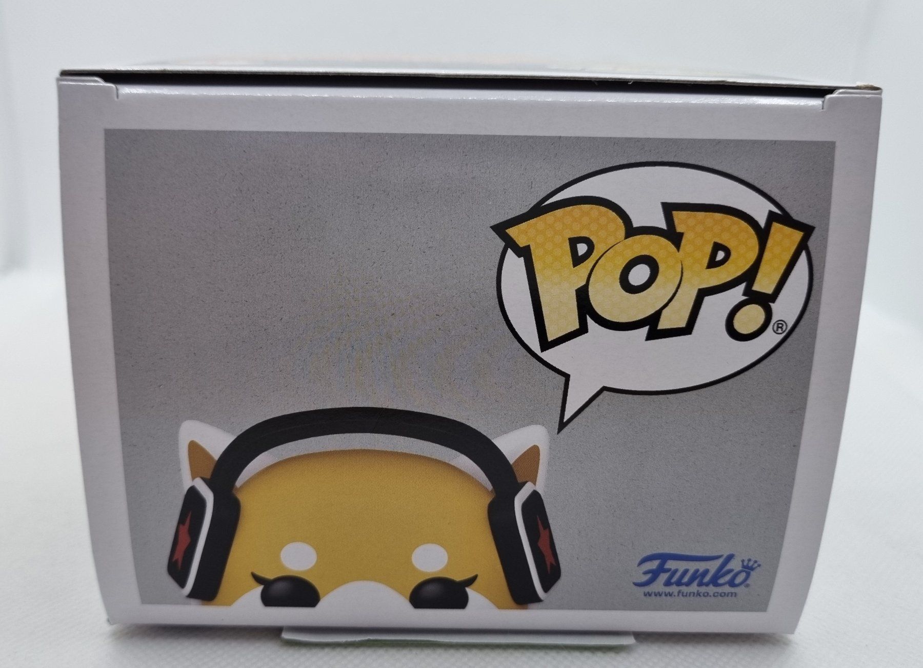 Funko Statuette: Funko POP! Aggretsuko - Aggretsuko with headphones – Nuovo (secondo la descrizione) da Vernayaz venduto da fnkochase 5