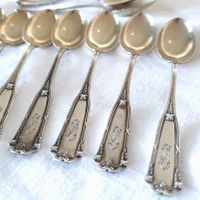 12 anciennes cuillères à moka en argent 800