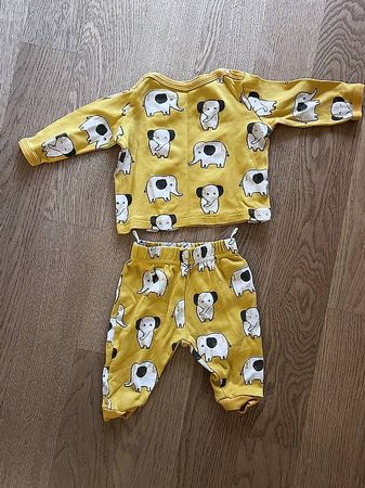 Baby Kleider Trainer Gr. 52