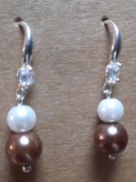 Elegante Ohrringe mit Perlen, neuwertig