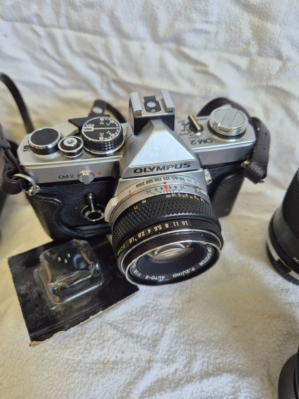 Olympus Kamera: Olympus OM-2 Analog – Gebraucht aus Richterswil von Heizung77