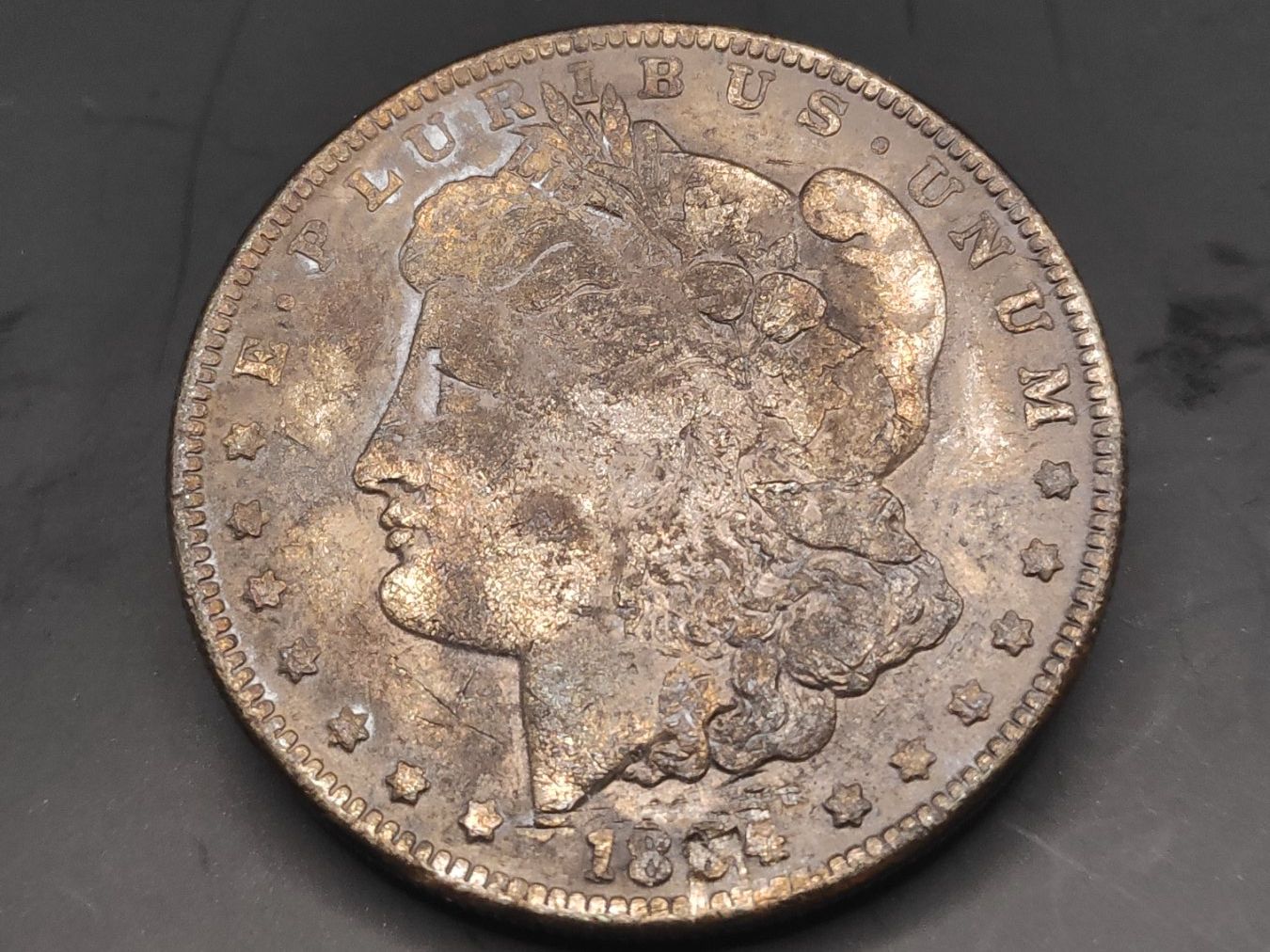 Tutti le monete: 1884 Morgan Silber Dollar mit Patina – Usato da Sirnach venduto da Trekk64
