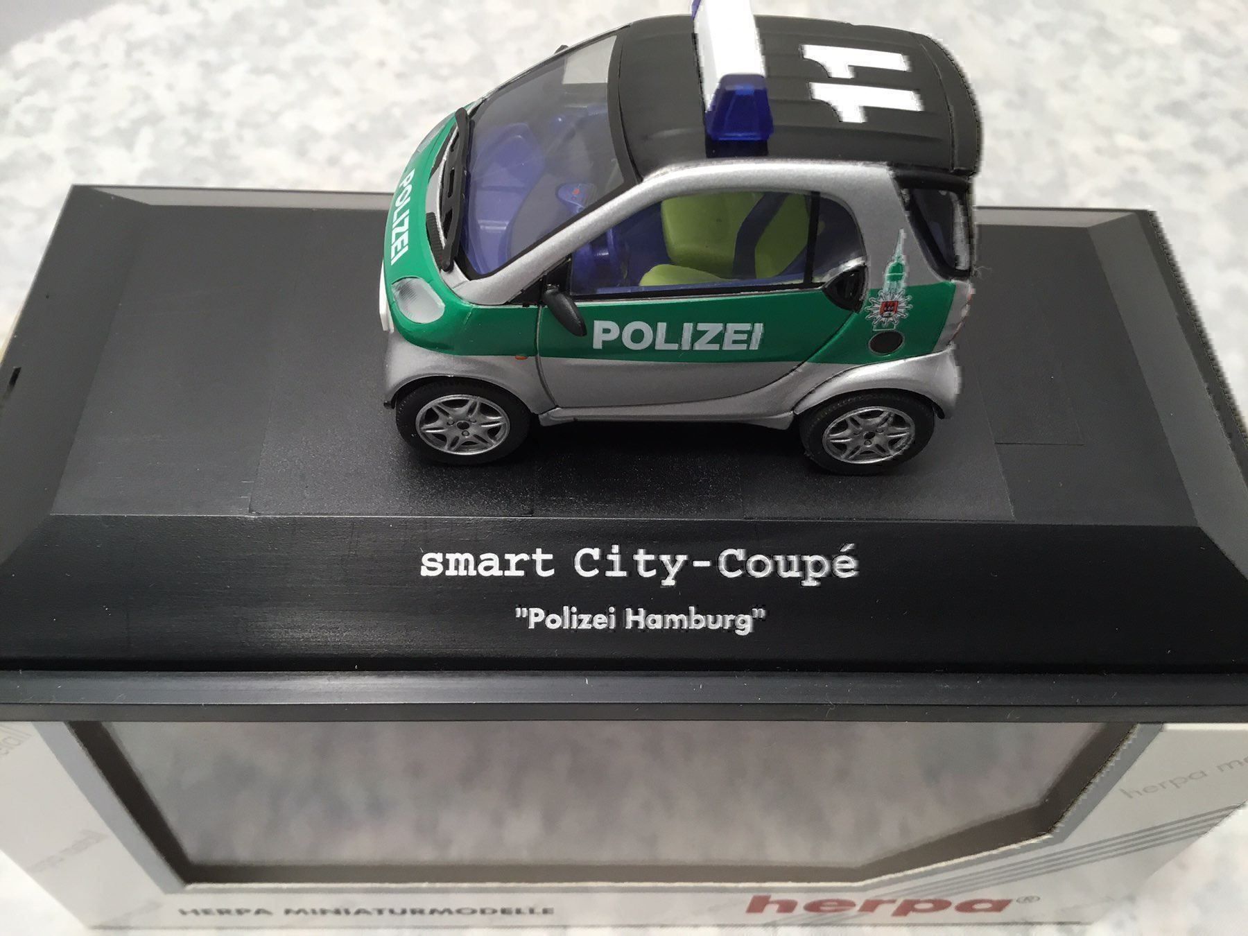 Smart Modellini d'auto: Polizei SMART – Nuovo e nell'imballaggio originale da Erlenbach im Simmental venduto da Model_box 1