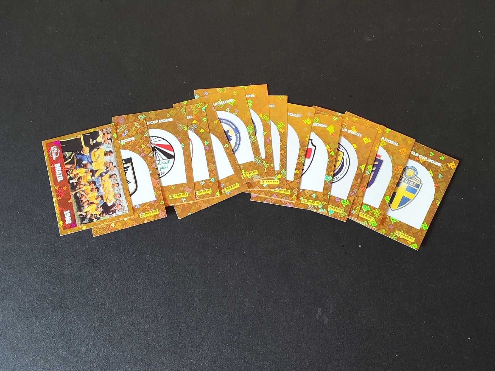 Panini Carte collezionabili: Panini WM26 Goldwappen – Nuovo (secondo la descrizione) da Breitenbach venduto da Lqris