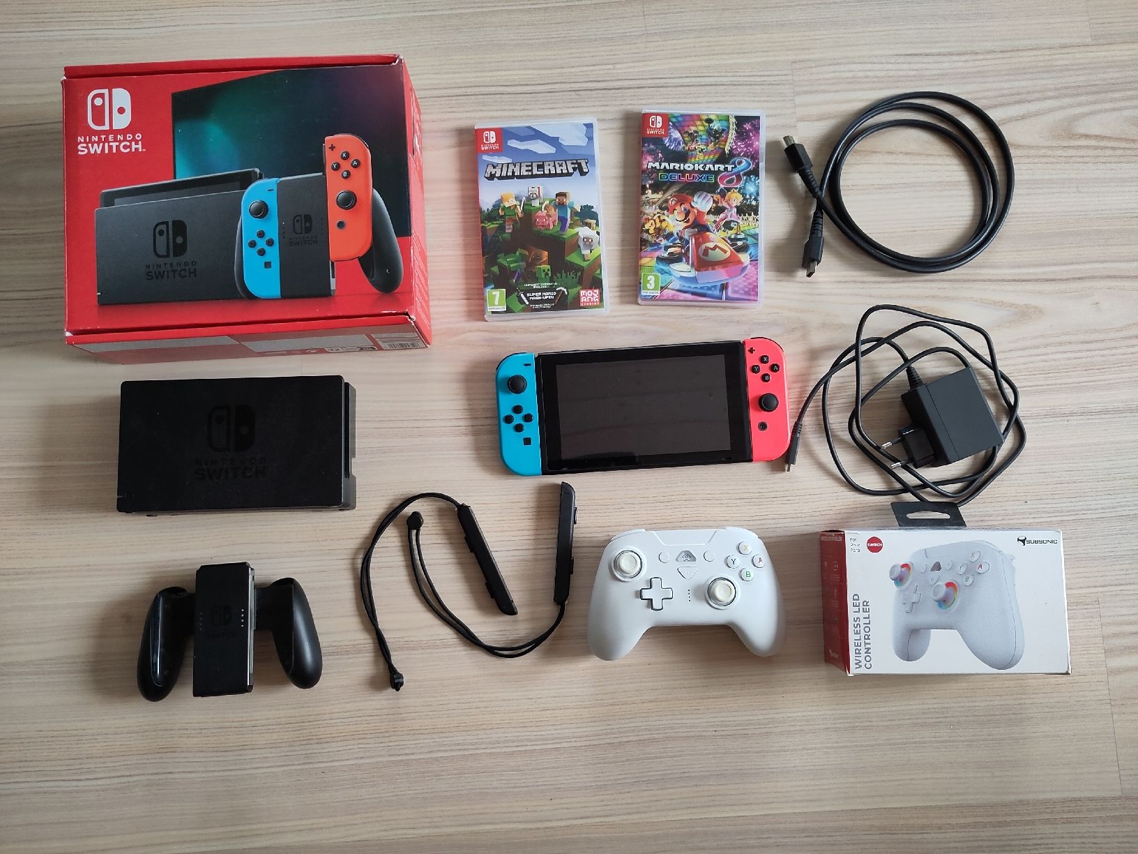 Nintendo Konsolen: Nintendo Switch Konsole mit 2 Spielen und LED-Controller – Neu (gemäss Beschreibung) aus Interlaken von Flua