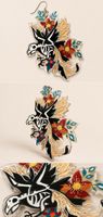 Boucle artistiques “ le corbeau floral“