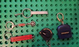 Lot Schlüsselanhänger Bieröffner Meter Kugellager Messer Waa