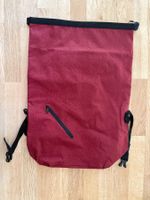 Spende Theodora Stiftung - Roter Rolltop-Rucksack wie neu