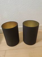 Deux abat-jour noir, intérieur doré