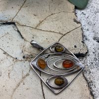 Vintage/Antik Anhänger Sterlings. Mit Bernstein