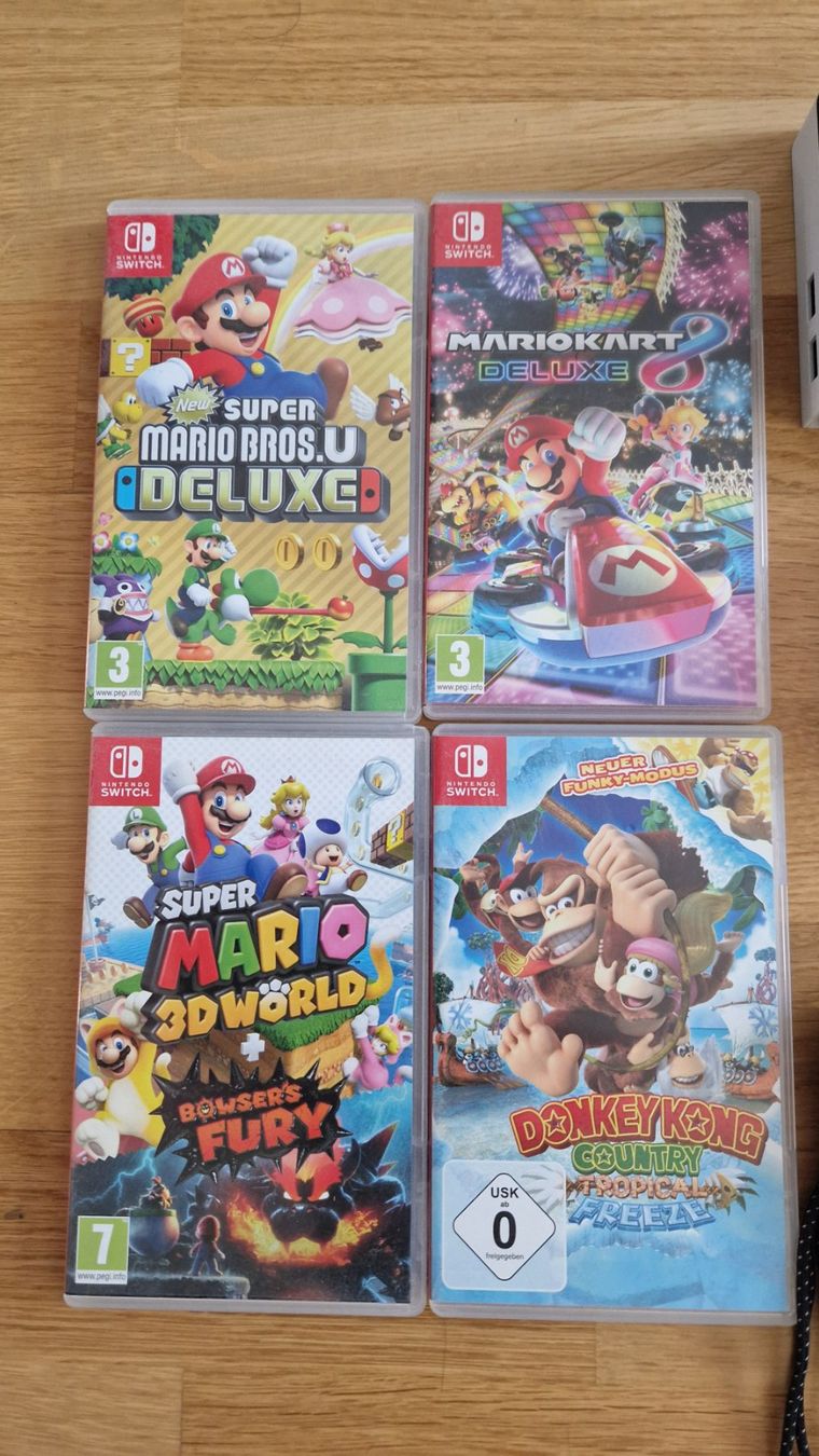 Nintendo Consoles: Nintendo Switch Oled + 4 Spiele! Selten benutzt! – D'occasion à Aarberg par Daniela_Meyer 1
