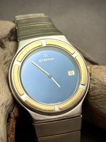Montre Eterna 18K bezel date bleue 34.5mm, fonctionne
