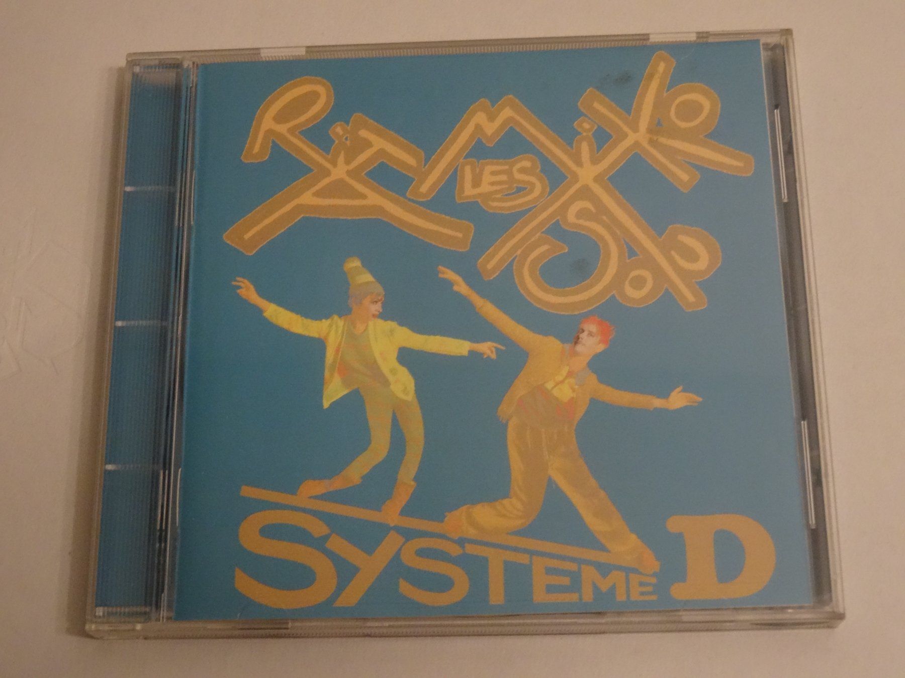 CD: Remix Les Rita Mitsouko - System D, CD – Usato da Olten venduto da Disc-Ausverkauf