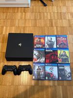 PlayStation 4 Pro 1TB + 2x Controller + 11 Games