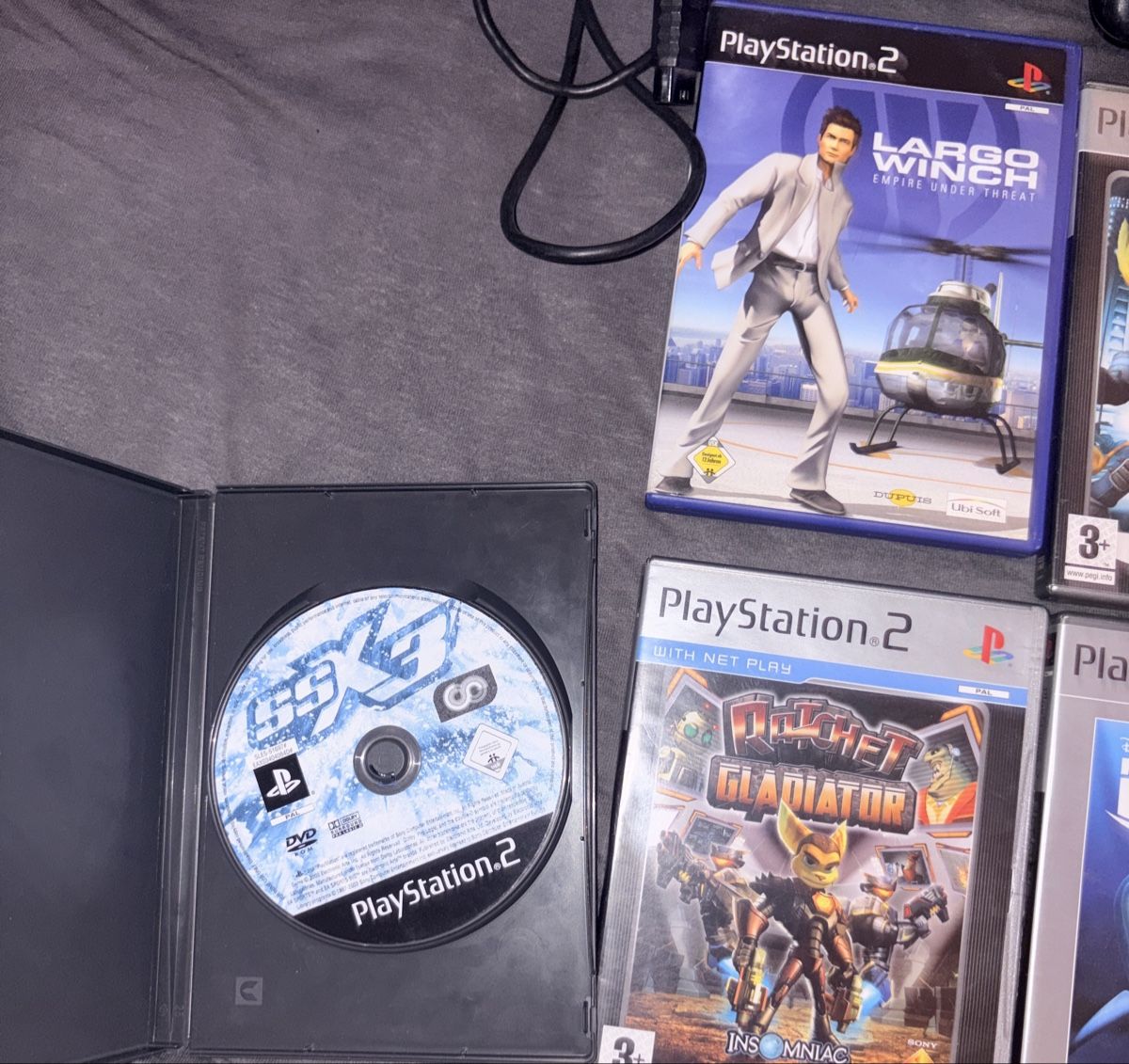 Sony Consoles: Playstation 2 + 2 Controller + 17 Spiele – D'occasion à Regensdorf par Deqzil 1