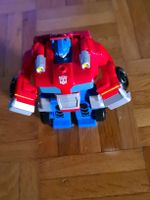 Transformers EarthSpark 1-Step Smash Changers Optimus Prime 