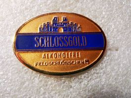 Ansteckpin 9: Feldschlösschen Schlossgold Alkoholfrei