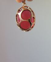 Pendentif en plaqué or et rubis synthétique 