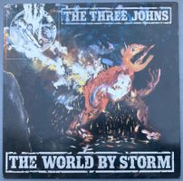 THE THREE JOHNS - THE WORLD BY STORM