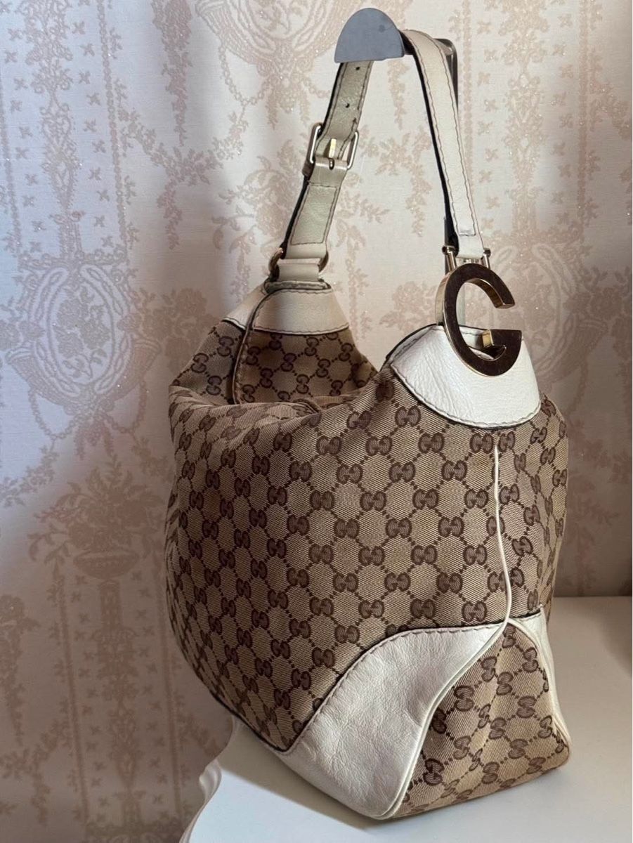 Gucci Borse da donna: Gucci Monogram Medium Charlotte Hobo Off White – Usato da Buch am Irchel venduto da Pukpan_99 1