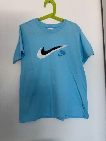 T-shirt Nike bleu clair taille 137-147 cm