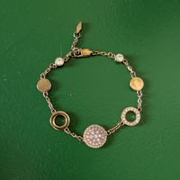 Bracelet fantaisie doré et strass