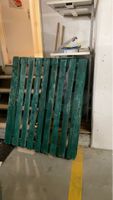 Green painted wooden pallet