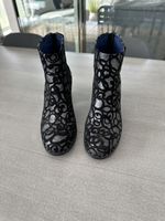 Extravagante  schwarze Stiefeletten Gr. 38