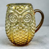 Superbe pichet hibou vintage en verre ambré. 2L