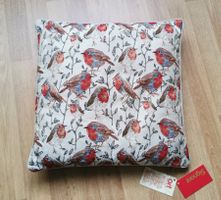 Hübsches Sofakissen mit Rotkehlchen-Motiven