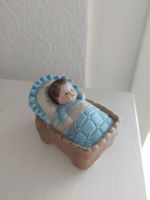 herziges Püppchen im Bett